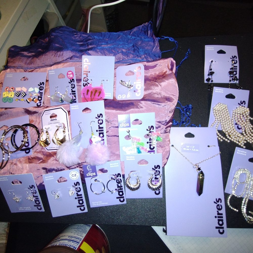 Claire's Assorted Jewelry Collection with Purple and Silver Highlights